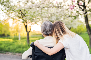 Photo of a younger woman with an older woman to illustrate the need for alternatives to guardianship in NC