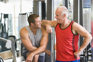 Photo of two generations of men in the gym to focus on Men's Health Month