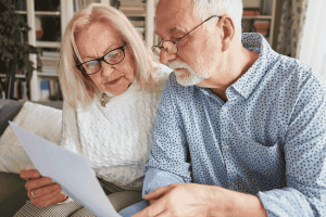 Photo of an older couple reading a Power of Attorney NC