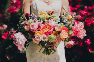 Photo of a bride with flowers to illustrate the need to update your estate plan after marriage