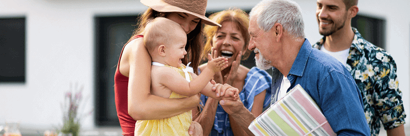 Photo of a multi-generational family to illustrate who benefits with comprehensive estate planning.
