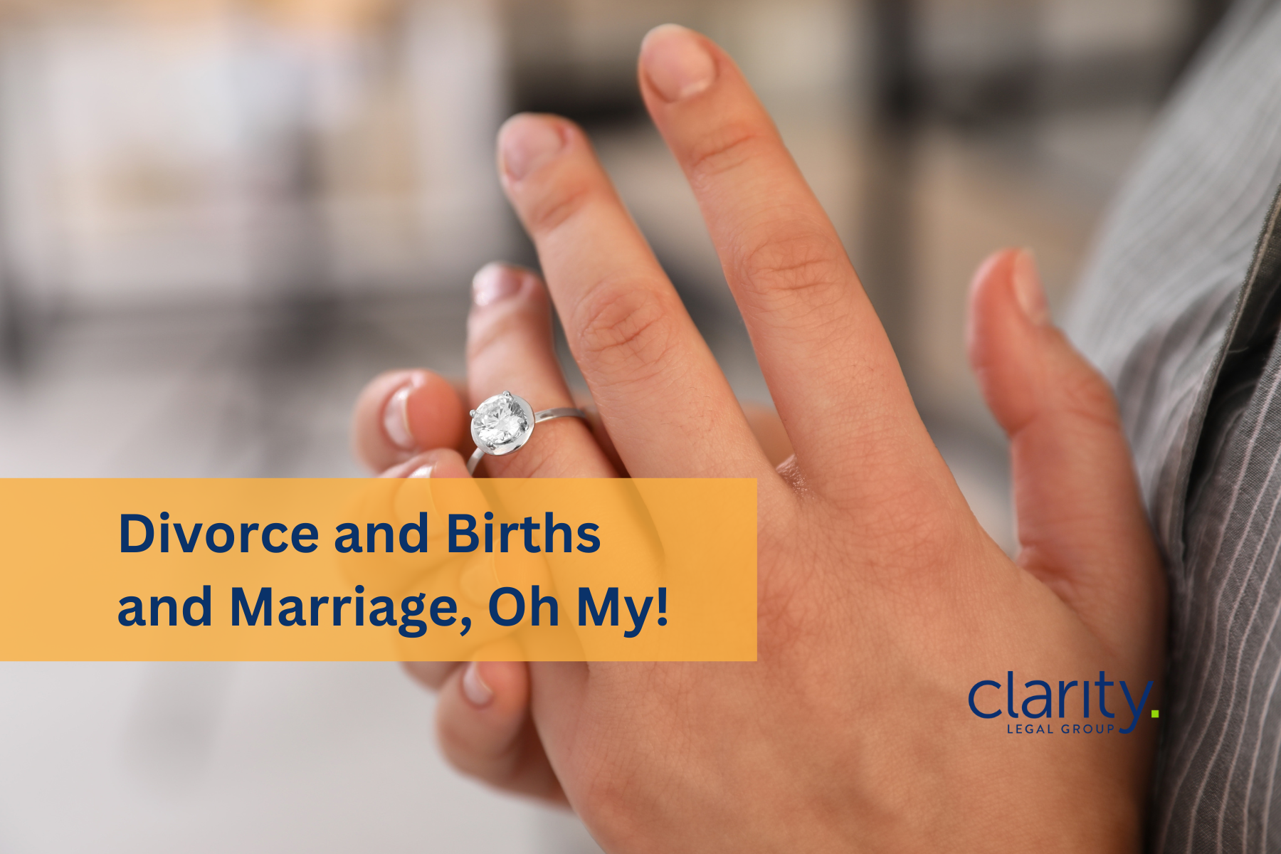 image of a woman fiddling with her wedding ring to illustrate the need to update estate plan after divorce. There's an overlay of the words "Divorce and births and marriage, oh my!"